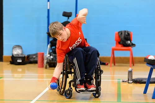 A member of the Talented Athlete Scholarship Scheme plays Boccia